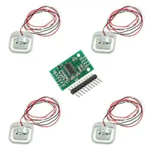 Electronic buzzer kit with circuit board, wires, and components for DIY electronics projects.