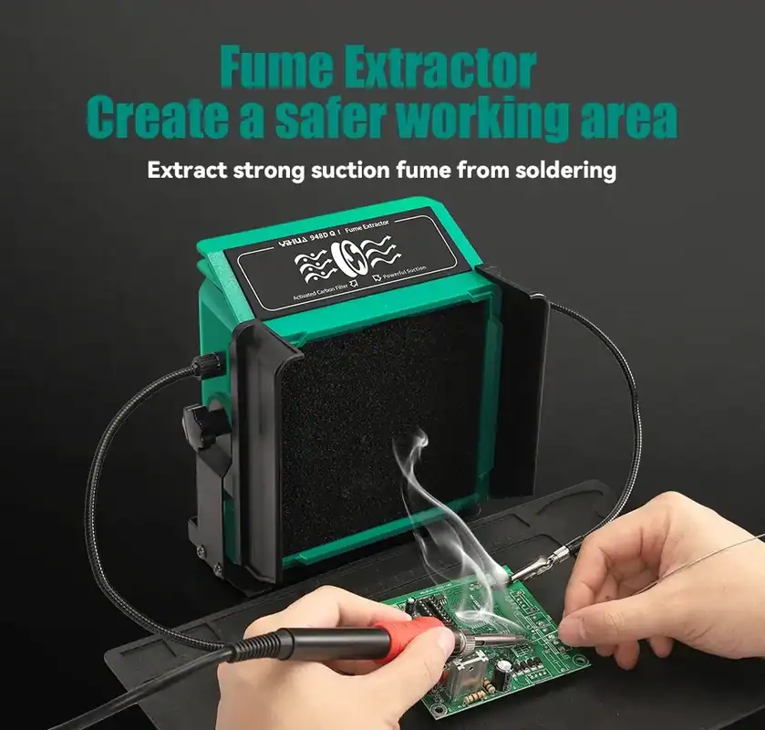 YIHUA 948DQ-I fume extractor drawing solder smoke away from a circuit board through its activated carbon filter panel